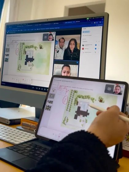 We work with clients everywhere. This image shows a virtual design meeting for a farmhouse project, where we use digital tools to review plans and make real time annotations, ensuring a hands on process no matter the distance.