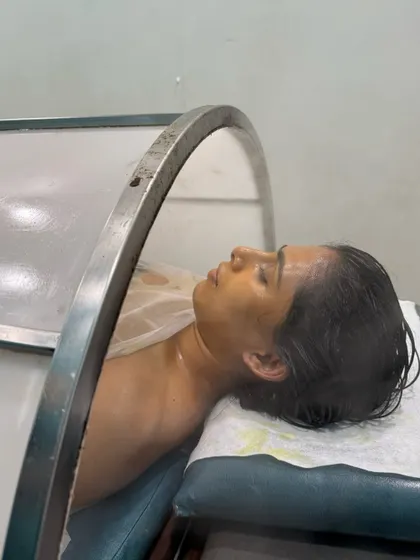 This is a glimpse of our herbal steam therapy, or Swedana. It helps open up the pores, release toxins, and prepares the skin to better absorb the nutrients from subsequent treatments like facials.