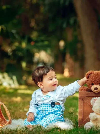 A sweet interaction with a teddy bear. These are the simple, precious moments I love to capture.