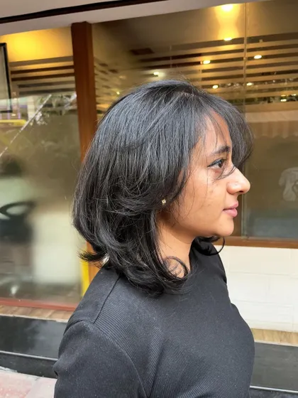 How to conceal a broad forehead and cut fine hair to add volume.