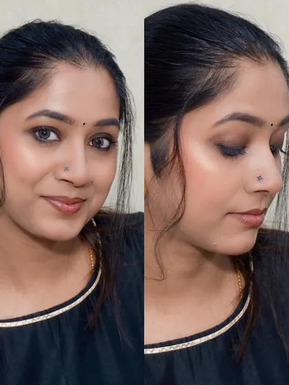A smokey eye look paired with a simple black top and different silver nose pins.