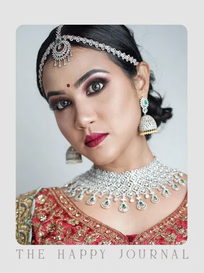 A striking close-up portrait that emphasizes the eyes and jewelry. The direct, confident gaze makes this a powerful image for an actor's headshot or a model's beauty shot.