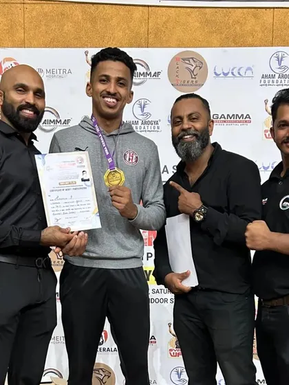 Presenting a gold medal to one of our champions at the Kerala Nationals 2024.