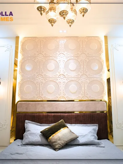 The headboard wall in the Parisian bedroom is a statement in itself, with ornate wall lamps, 3D panels, and a custom-designed bed.