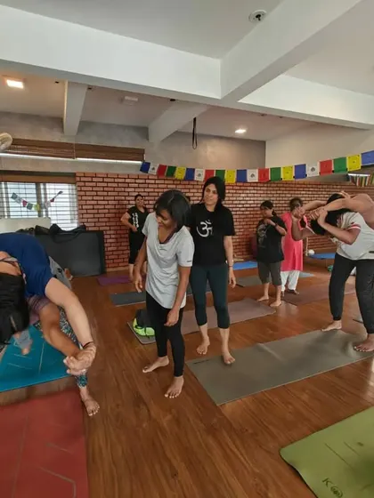 Guiding students through various partner exercises. These workshops are designed to be interactive and engaging, making the practice of yoga a shared experience.