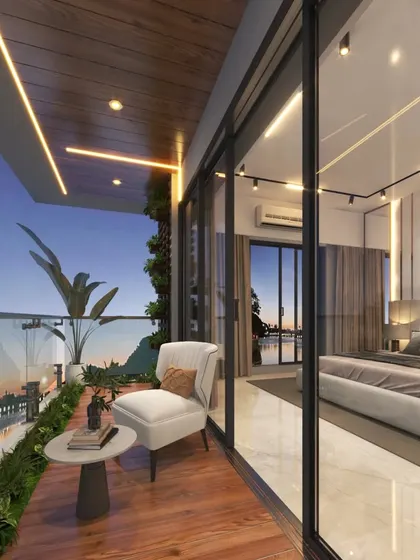 This balcony, accessible from the master bedroom, offers a luxurious private retreat with a comfortable armchair and a stunning view, perfect for morning coffee or evening relaxation.