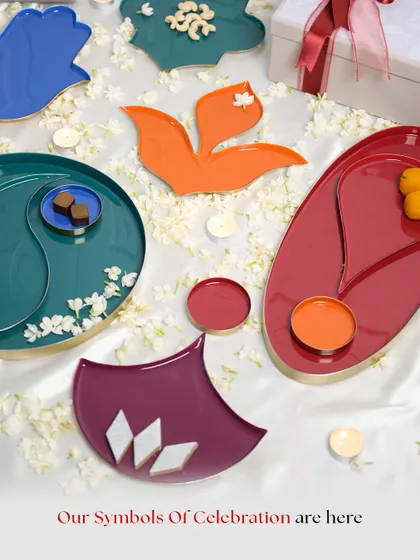 Our Symbols of Celebration are here. This flat lay showcases the entire collection of colorful, symbolic trays and plates, perfect for making the moments you cherish even more beautiful.