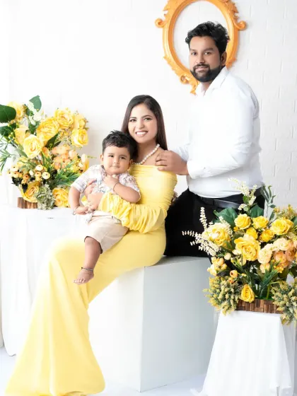 A loving family portrait where the mother holds her son. These photos become cherished heirlooms that document your family's growth over the years.