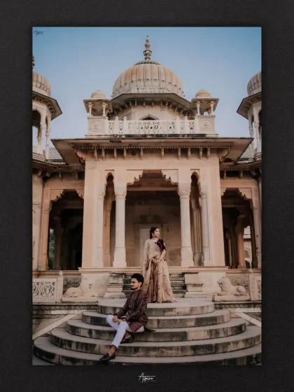 A beautifully framed portrait of Ayush and Akshitha. The strong architectural lines of the cenotaph create a powerful composition, highlighting the couple as the central focus in this grand setting.