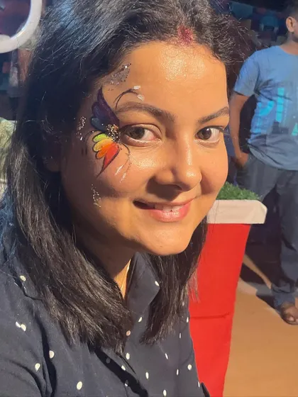 A front-facing view of the vibrant rainbow butterfly design.