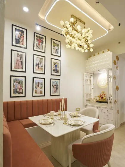 This angle shows the dining nook next to a custom-designed pooja mandir. I always work to integrate all your family's needs into a cohesive design.