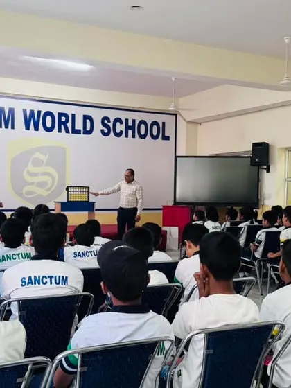 Students at the Sanctum World School workshop, eager to participate. These events are a powerful tool for student acquisition.