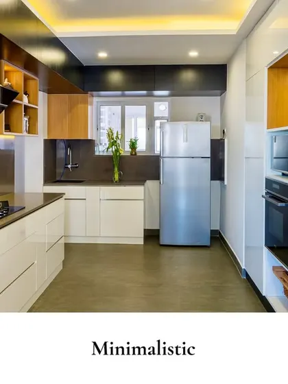 A minimalist kitchen with clean lines, a mix of dark and wood-finish textures, and open shelving, creating a space that feels modern and organized.