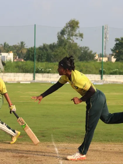 A run-out attempt in progress, capturing a moment of high drama and sharp fielding.
