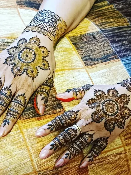 This mandala-focused design is elegant and striking. It's a great option for someone who wants a bold look that isn't full coverage.