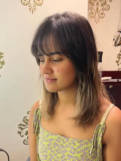 A medium length shag haircut for Priyansha.