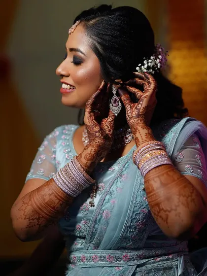 A collection of my brides looking stunning for their reception, sangeet, and cocktail parties. Each look is customized to match their outfit and personality.