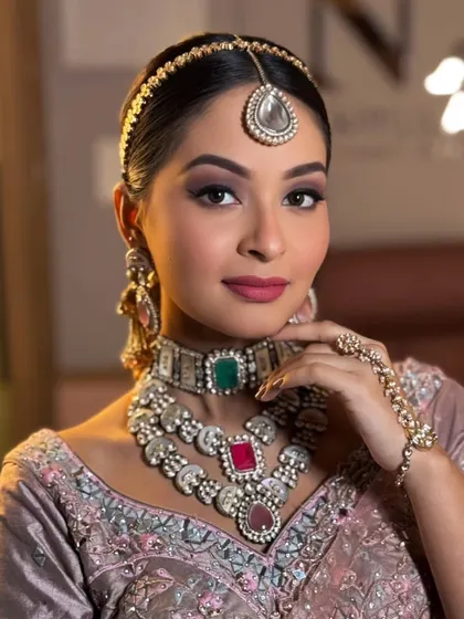 Another angle of this polished and glamorous makeup, perfect for any grand celebration.