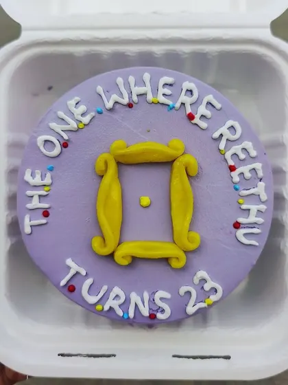 "The One Where Reethu Turns 23." I love making these F.R.I.E.N.D.S themed bento cakes with the iconic purple door frame.