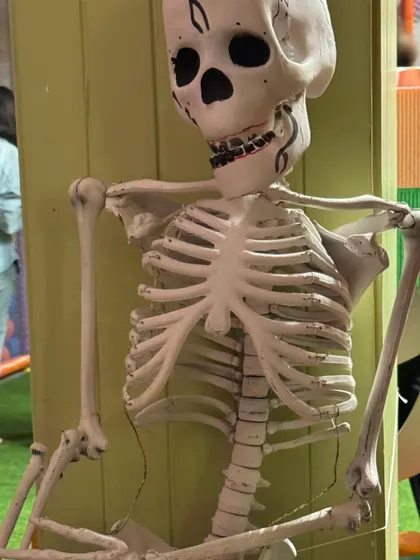 Even our resident skeleton gets a little face paint for the party. It's these small, fun details that make our Halloween event a place where everyone can smile.
