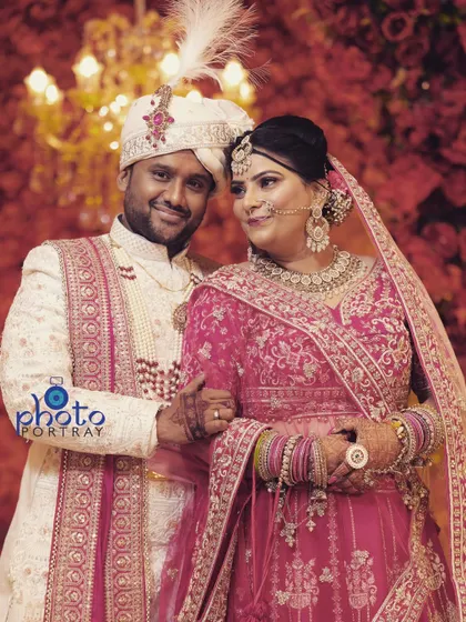A timeless portrait of the bride and groom, showcasing their beautiful wedding attire and their connection.