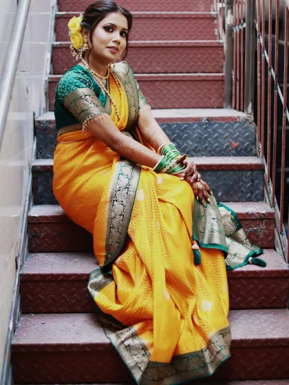 A gorgeous Maharashtrian bride. I loved creating this look with the traditional nauvari saree, nath, and a beautiful hairstyle featuring fresh yellow flowers.