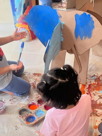 A collection of moments from our "Elmer's Art Party." Children and parents got messy painting their own 3D elephants, creating patchwork art, and exploring different textures. It was a joy to see families creating together.