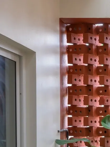 A close-up view of the brick screen from the inside, showing how it frames the view while maintaining privacy.