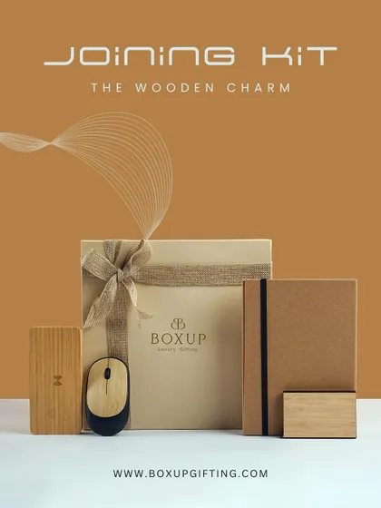 Here is The Wooden Charm hamper, presented as a complete joining kit. This set includes a wooden mouse, a power bank, and a notebook, offering a unique and eco-friendly welcome to new team members.