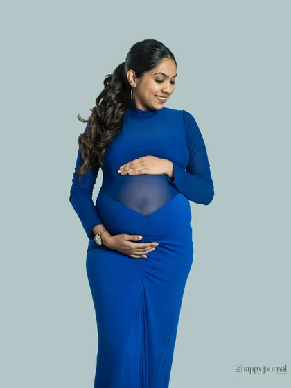 Bold and beautiful in blue. This form-fitting gown with sheer panels is a modern and stylish choice from my client wardrobe, perfect for a confident and elegant maternity portrait.