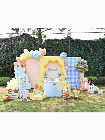 Another full view of our Winnie the Pooh setup, showing all the characters and decorative elements like the beehive and 'hunny' pots, creating a complete themed world.