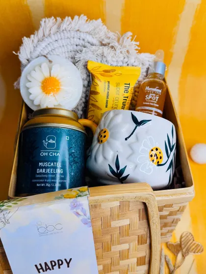 A top-down view of the contents of our "best-tea" Mother's Day hamper, showcasing the curated selection of relaxing and pampering products.