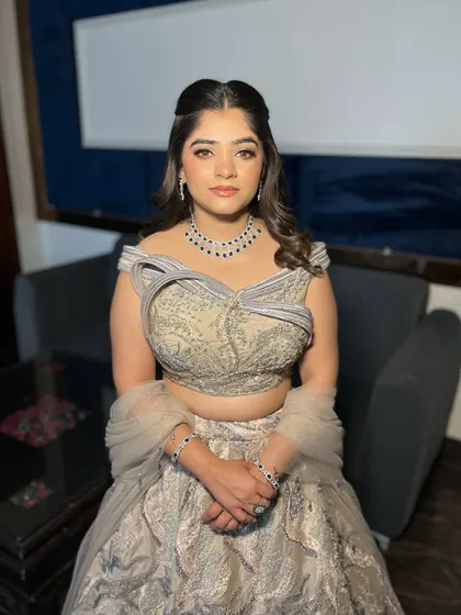 The beautiful Jaya, looking timeless for her engagement. The makeup is glamorous yet soft, with a focus on her eyes.