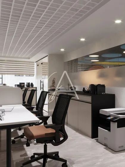 A shot of the utility and printing station, seamlessly integrated into the main office area. We ensure that even the most functional zones are designed to match the overall aesthetic of the workspace.