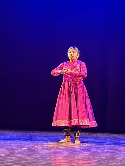 A performance showcasing the traditional `anarkali` style costumes of Kathak. Our students learn about the cultural context, including the attire and history, of the dance forms.