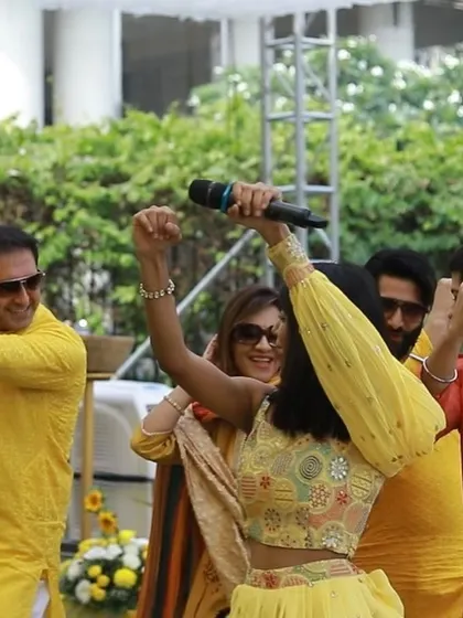 Getting the guests to dance during a daytime Haldi ceremony. My job is to break the ice and get everyone moving and enjoying the celebration.