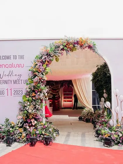 The grand entrance to the BWF 2023 meetup. A lush floral arch welcomed over 500 industry mavens to an evening of networking and collaboration.