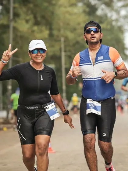 All smiles during the run leg of the Ironman 70.3 Goa. The camaraderie in our team helps push through the toughest moments.