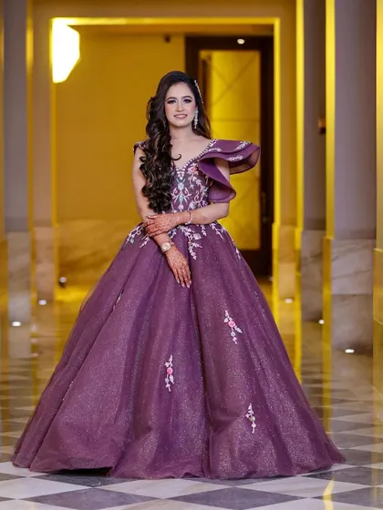 Feeling like a princess for her engagement. This client wanted a grand, fairytale look, and this gorgeous purple ball gown was the perfect match for her glamorous makeup.