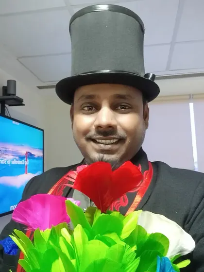 A close-up with my feather flower bouquets. These props allow me to produce large, colorful bouquets from thin air, adding a burst of visual surprise to my act.