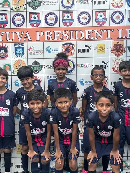 Our U9 team stands with their coaches before a Yuva President League match. This image shows the focus and unity of our young players as they prepare to compete.