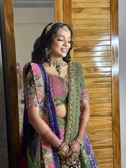 Another beautiful portrait, showcasing her radiant smile and the beautiful details of her outfit.