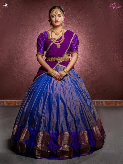 The full view of this majestic half saree, showcasing the rich Kanchi silk skirt and contrasting blouse.