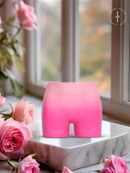 A quirky and fun piece from our collection. This pink ombre clutch shaped like a pair of shorts is for those who don't take fashion too seriously and love a conversation starter.