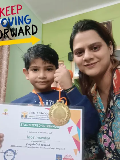 Keep moving forward! Our student Ashwani from Katra Banda proudly holds his runner-up certificate and medal.
