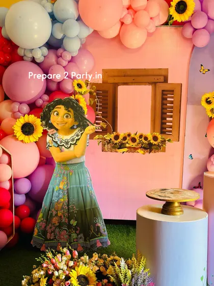 Step into the world of Encanto with these detailed party setups. I use colorful balloons, themed props, and character standees to recreate the magical atmosphere of the Madrigal family home.