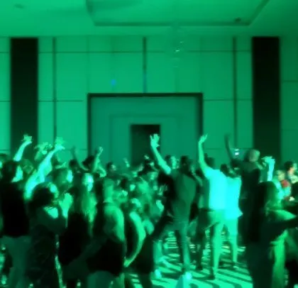 A wide shot of the dance floor at the Appario corporate event.