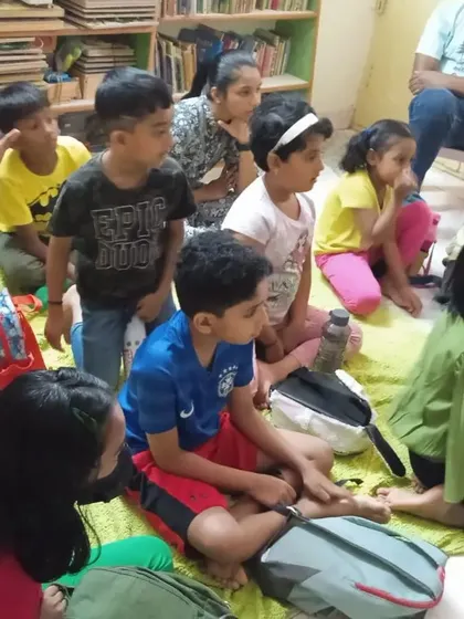 A room full of curious minds. The kids are seated and listening intently, ready for the next instruction at one of my popular science camps.