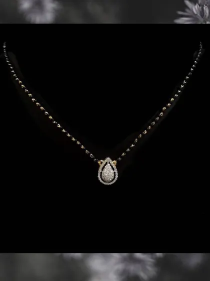 A duplicate image of the pear-shaped diamond mangalsutra. Its simple yet sophisticated design makes it one of our most requested pieces for the modern bride.