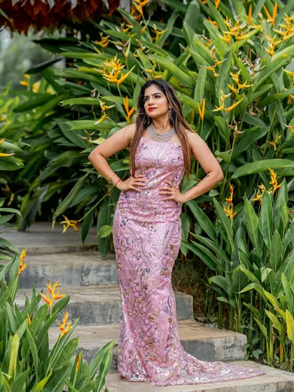 A beautiful pink sequined gown with a long train, perfect for a reception or red-carpet style event. This is another one of my custom designs available for rent.
